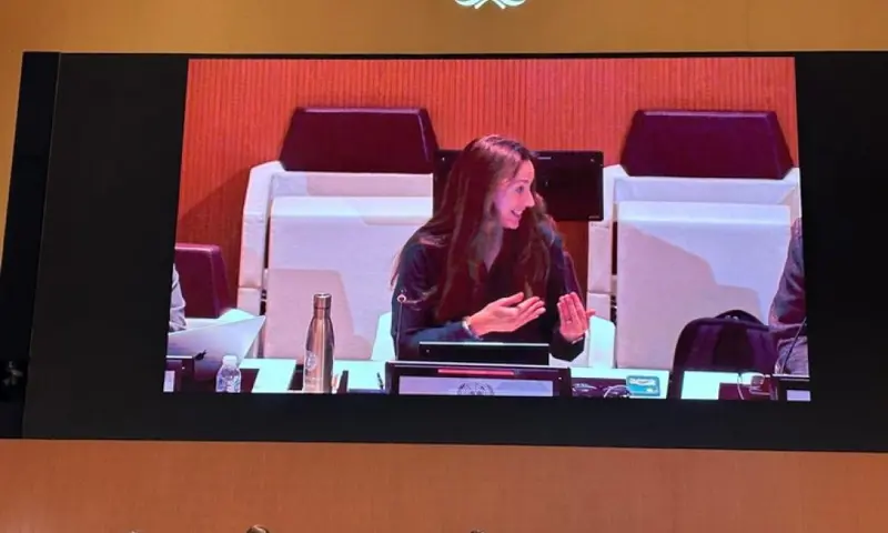 Photo of a woman on a screen