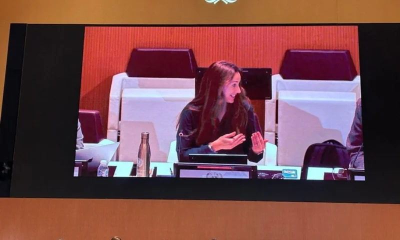 Photo of a woman on a screen